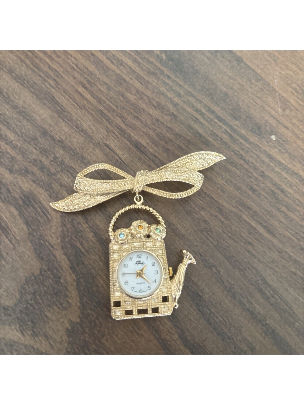 Vintage Faberge Gold Tone Ornate Watering Can Brooch Watch with Ribbon